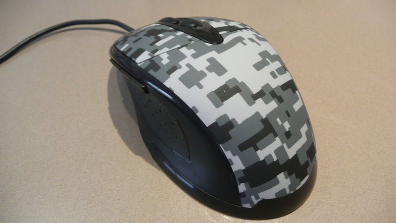 Illustration for article titled Hori's TAC3 Brings a Mouse and (Tiny) Keyboard to the PS3